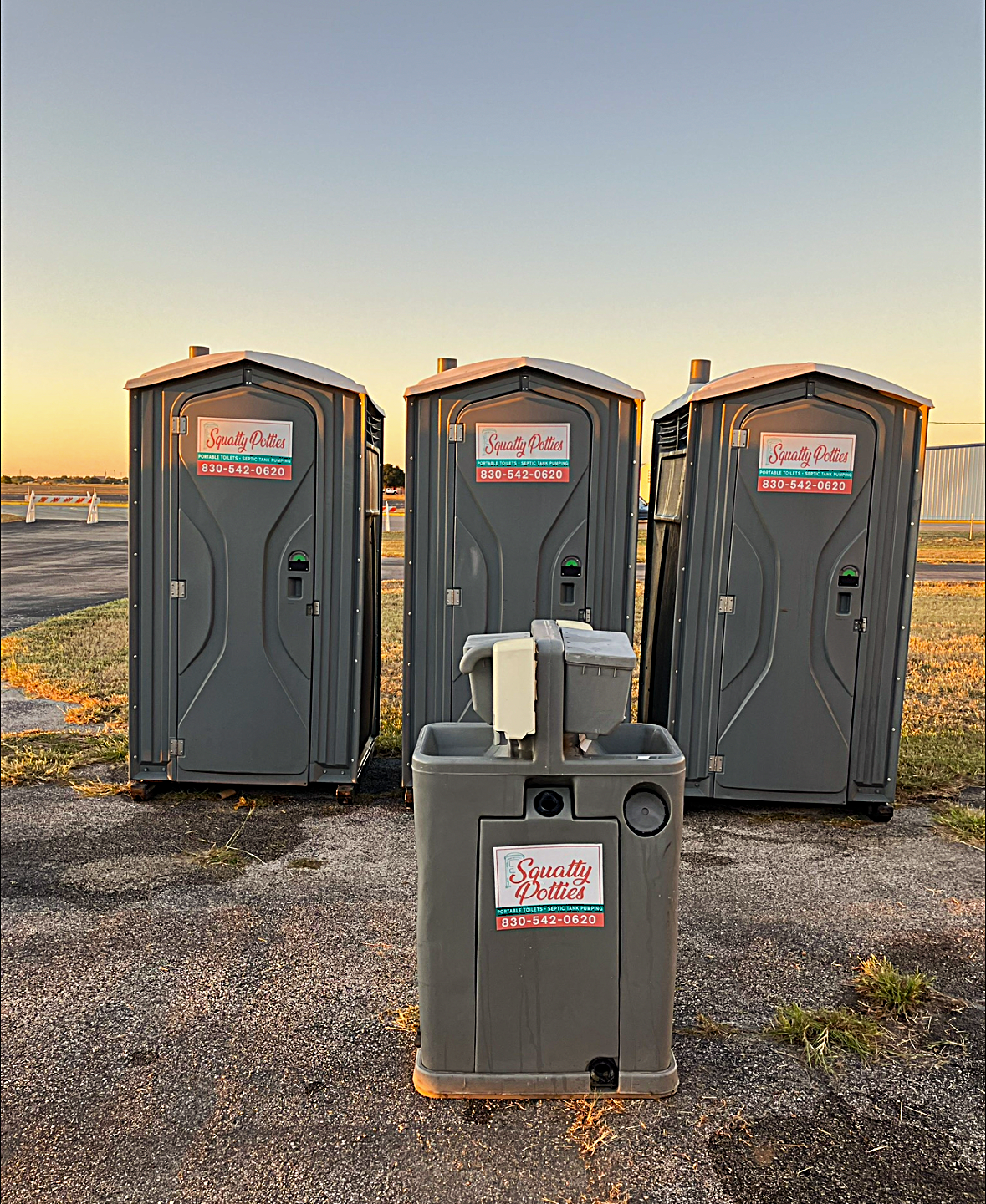 3 port-a-potties with mobile sink station